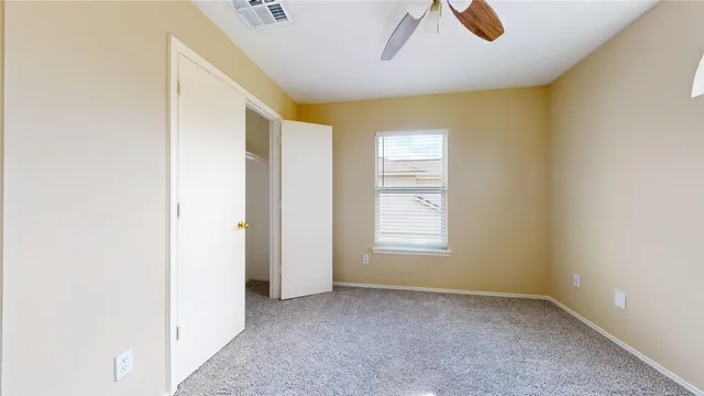 a view of an empty room with window