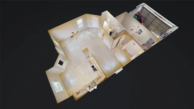 an aerial view of a house with pool and furniture