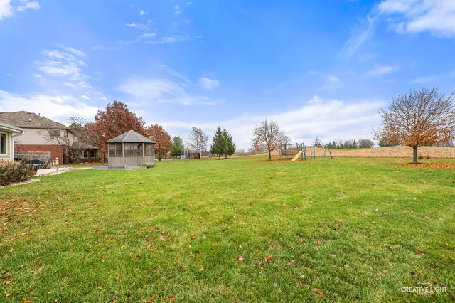 a view of a garden and trees