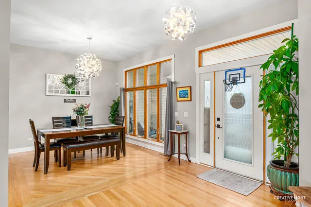 a view of a livingroom with furniture and chandelier