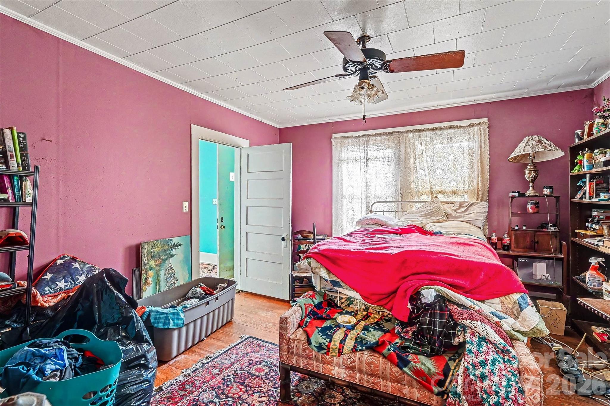 1116 Medlin Road Monroe, NC 28112 - Photo 22 of 40 a bedroom with furniture and a window