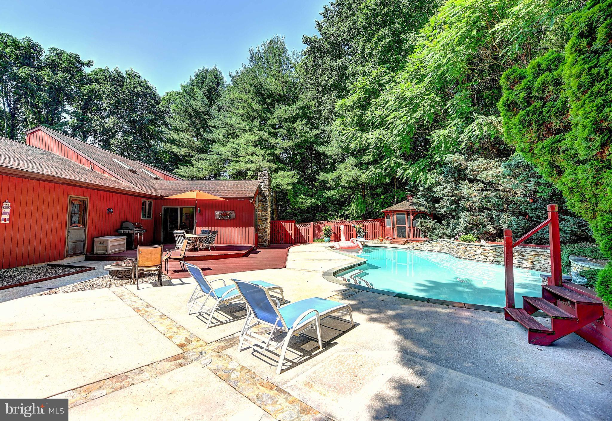 4516 Meadowcliff Road Glen Arm, MD 21057 - Photo 1 of 29 Dazzling Free-Form In-Ground Pool