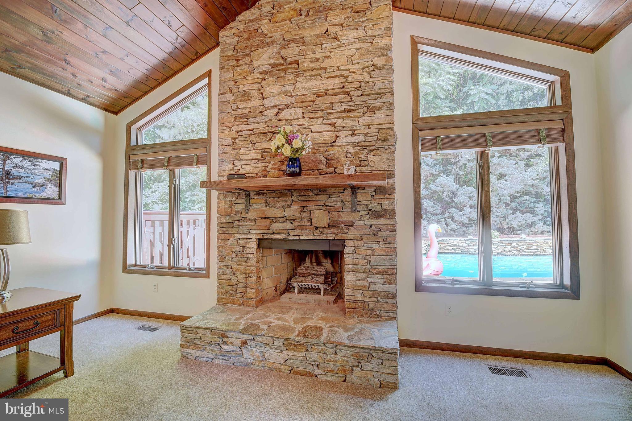 4516 Meadowcliff Road Glen Arm, MD 21057 - Photo 13 of 29 Floor to Ceiling Stacked Stone Fireplace