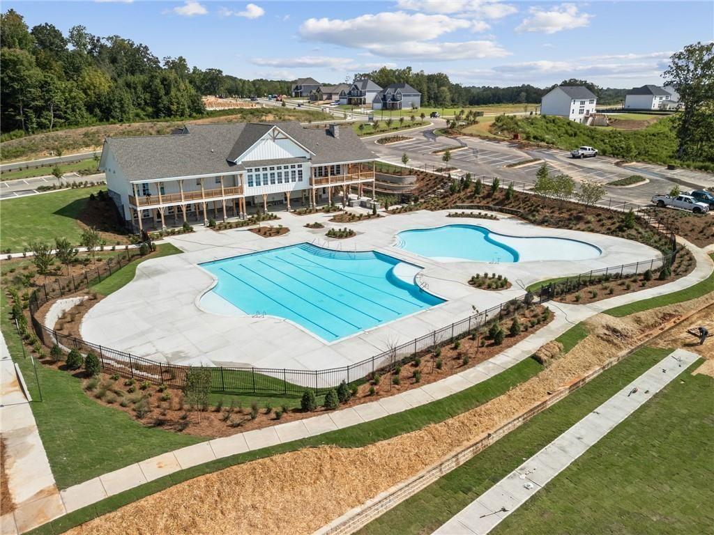 2682 Harbor Rdg Pass Gainesville, GA 30507 - Photo 13 of 42 a view of a swimming pool with an outdoor seating
