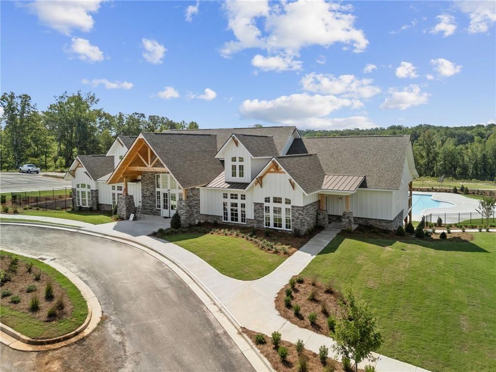 2682 Harbor Rdg Pass Gainesville, GA 30507 - Photo 16 of 42 an aerial view of a house with swimming pool and large trees