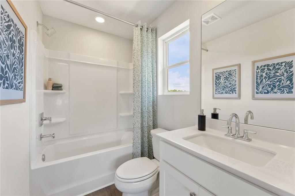 2682 Harbor Rdg Pass Gainesville, GA 30507 - Photo 31 of 42 a bathroom with a sink toilet and shower