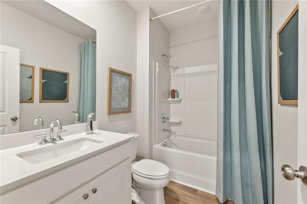 2682 Harbor Rdg Pass Gainesville, GA 30507 - Photo 39 of 42 a bathroom with a sink toilet and shower