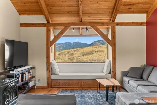 a living room with a couch and a flat screen tv
