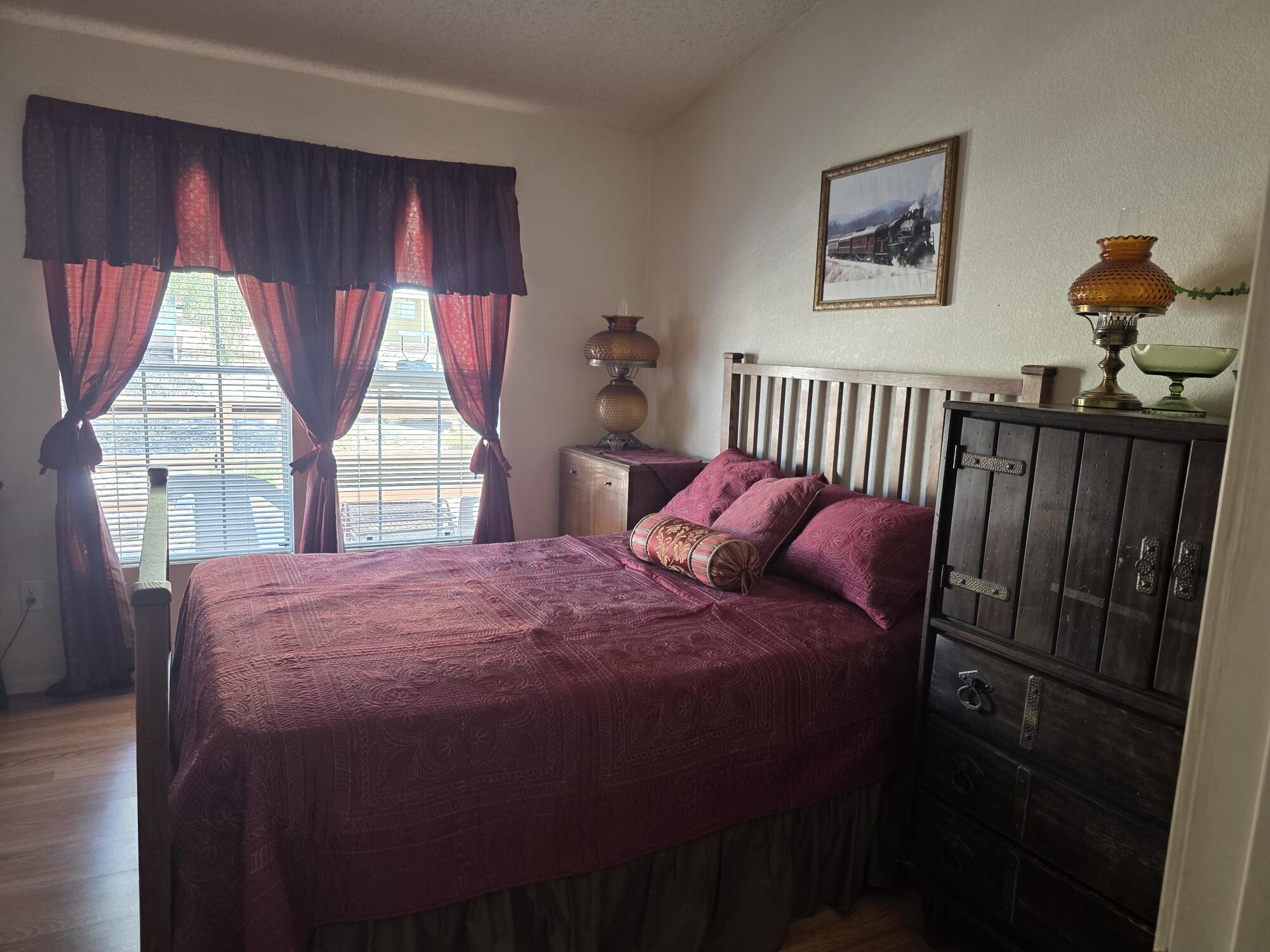 10595 Hot Mineral Spa Road, Unit 195 Niland, CA 92257 - Photo 15 of 32 a bedroom with a bed and a window
