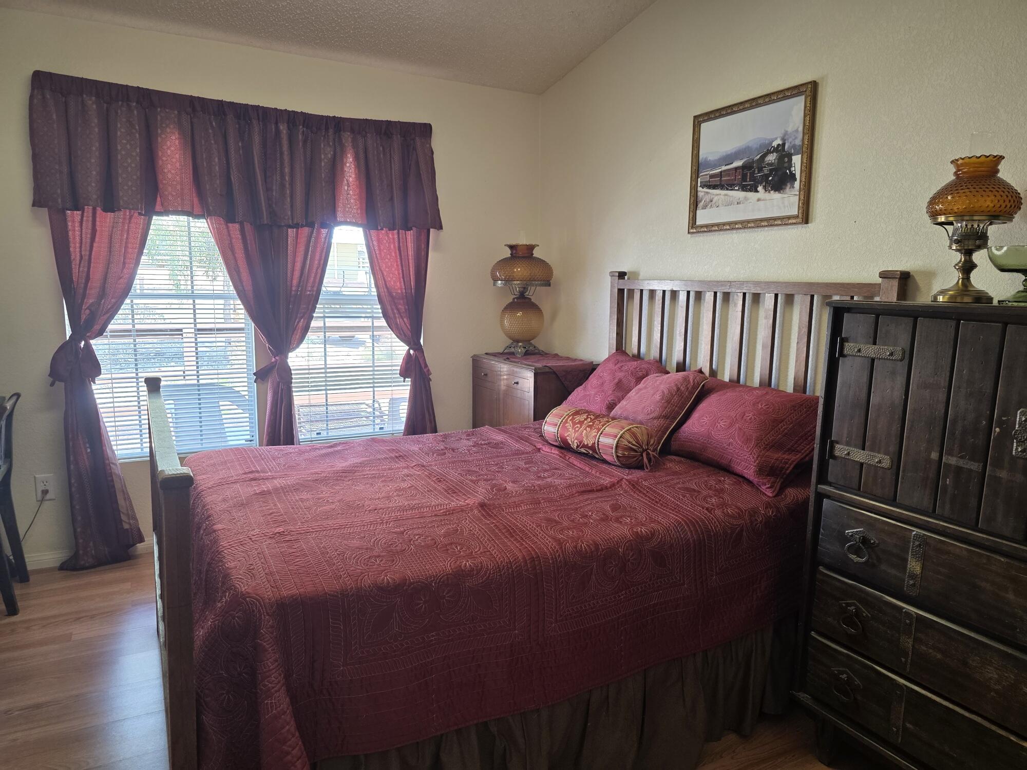 10595 Hot Mineral Spa Road, Unit 195 Niland, CA 92257 - Photo 17 of 32 a bedroom with a bed and a window