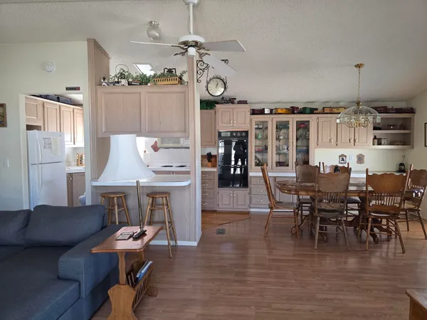 a front view of a house with large windows