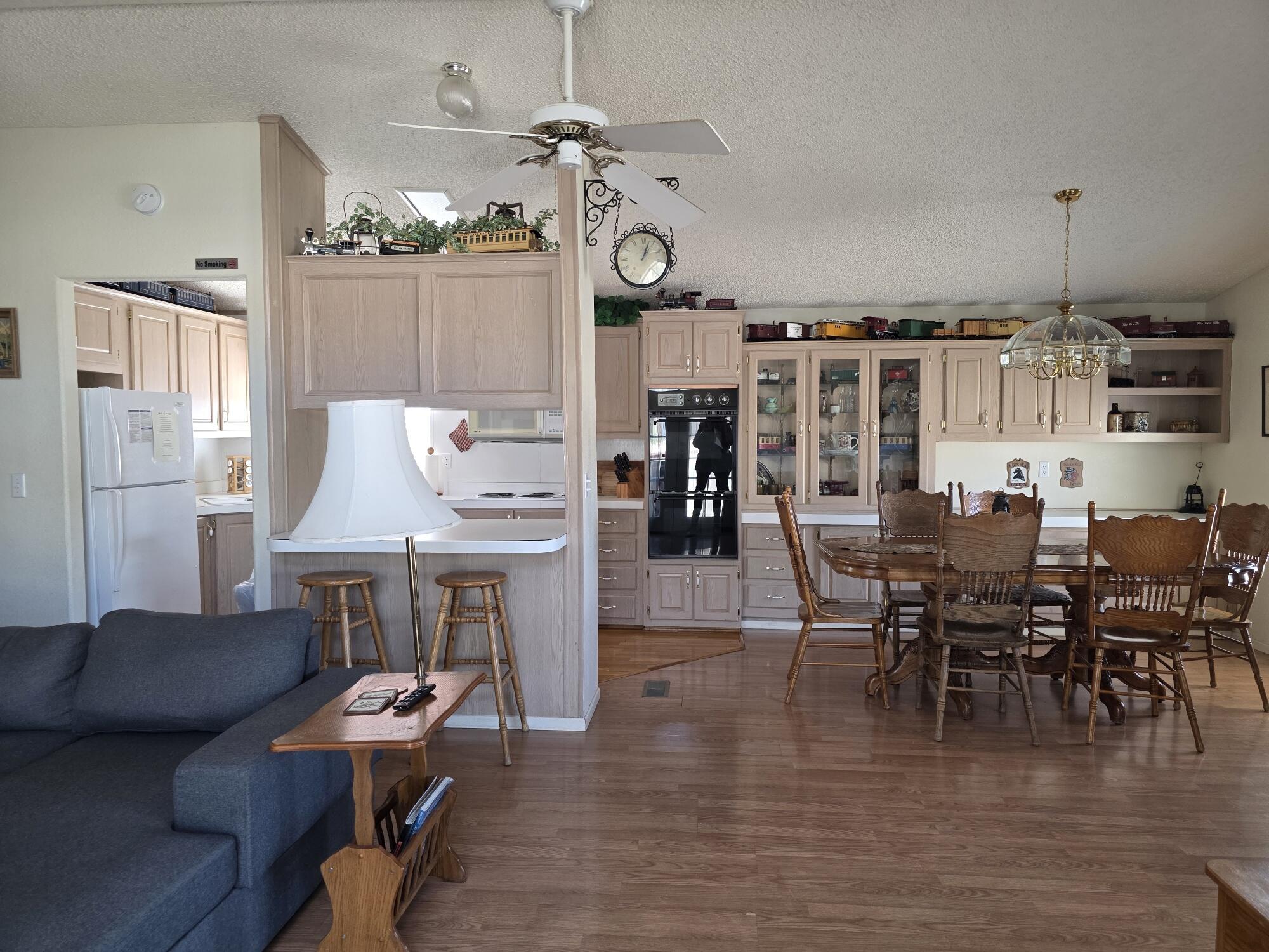 10595 Hot Mineral Spa Road, Unit 195 Niland, CA 92257 - Photo 7 of 32 a view of a dining room with furniture window and wooden floor