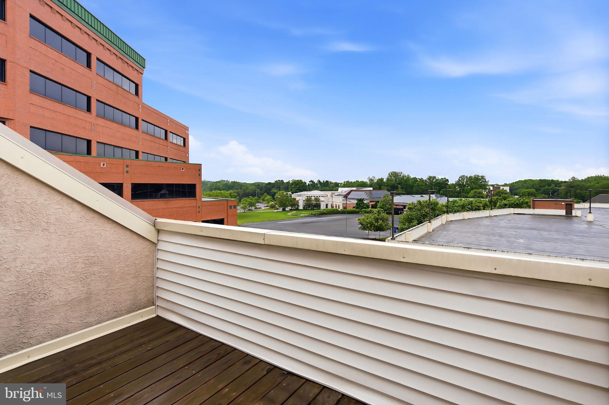 3036 Main Street, Unit 3036 Voorhees, NJ 08043 - Photo 18 of 24 Scenic rooftop view with open skies.