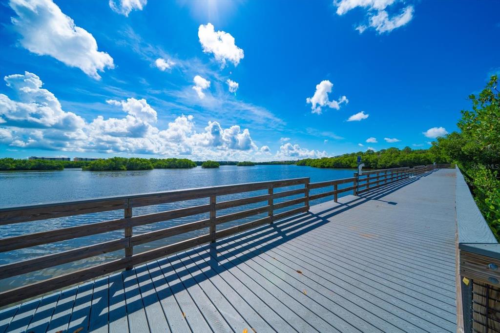 7069 Key Haven Road, Unit 304 Seminole, FL 33777 - Photo 20 of 50 a view of a balcony with dining space