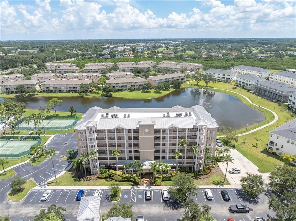 7069 Key Haven Road, Unit 304 Seminole, FL 33777 - Photo 2 of 50 a view of a city with tall buildings