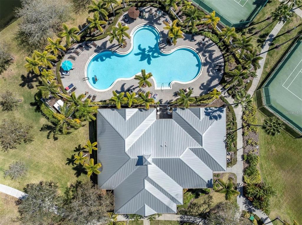 7069 Key Haven Road, Unit 304 Seminole, FL 33777 - Photo 21 of 50 an aerial view of a house with a swimming pool