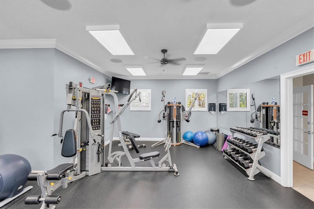 7069 Key Haven Road, Unit 304 Seminole, FL 33777 - Photo 27 of 50 a view of a room with gym equipment