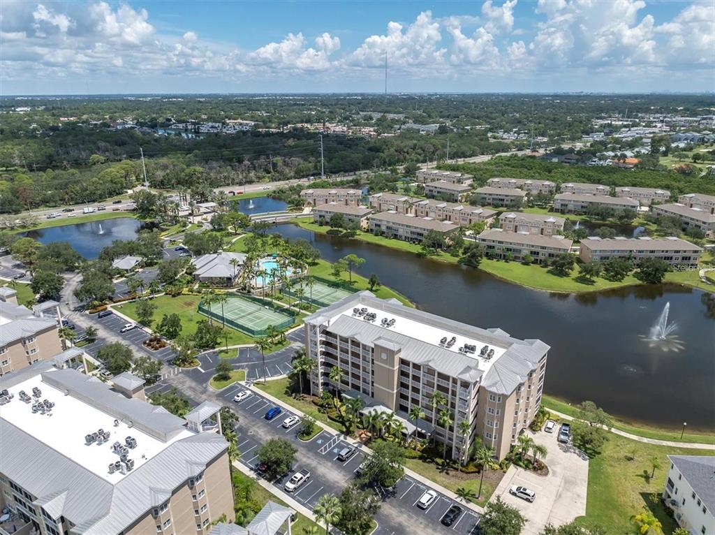 7069 Key Haven Road, Unit 304 Seminole, FL 33777 - Photo 32 of 50 an aerial view of a city with lake view
