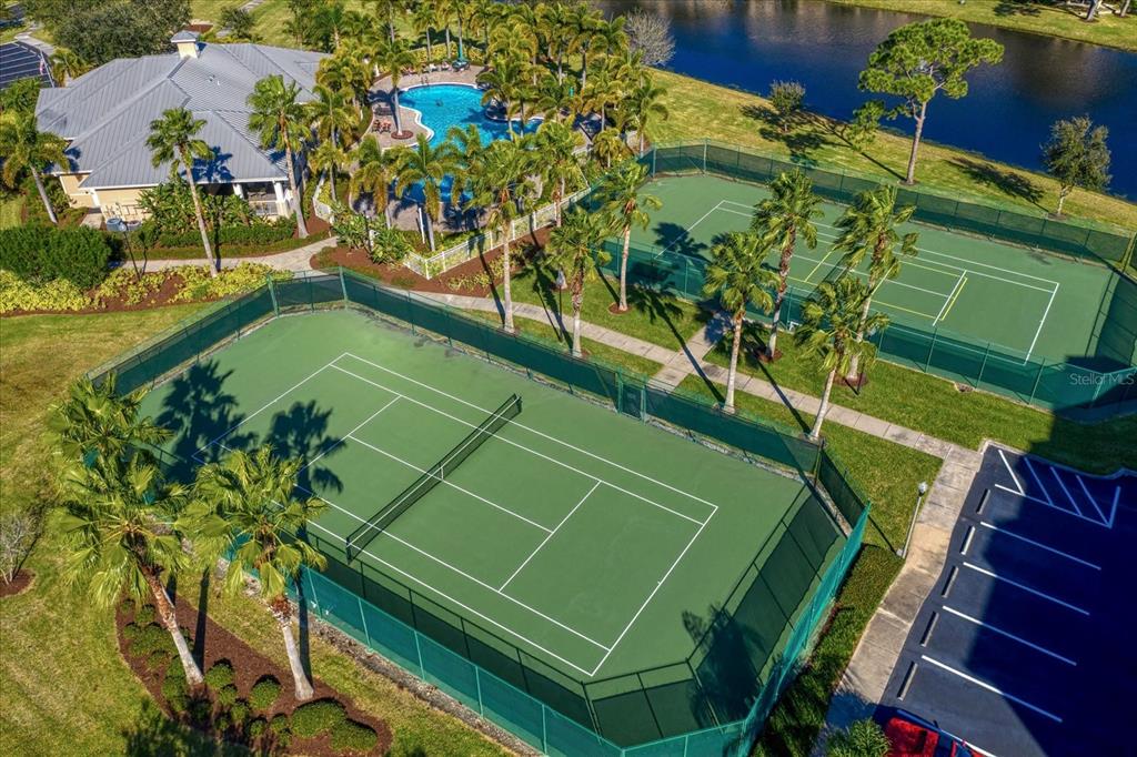 7069 Key Haven Road, Unit 304 Seminole, FL 33777 - Photo 38 of 50 a view of a tennis ground