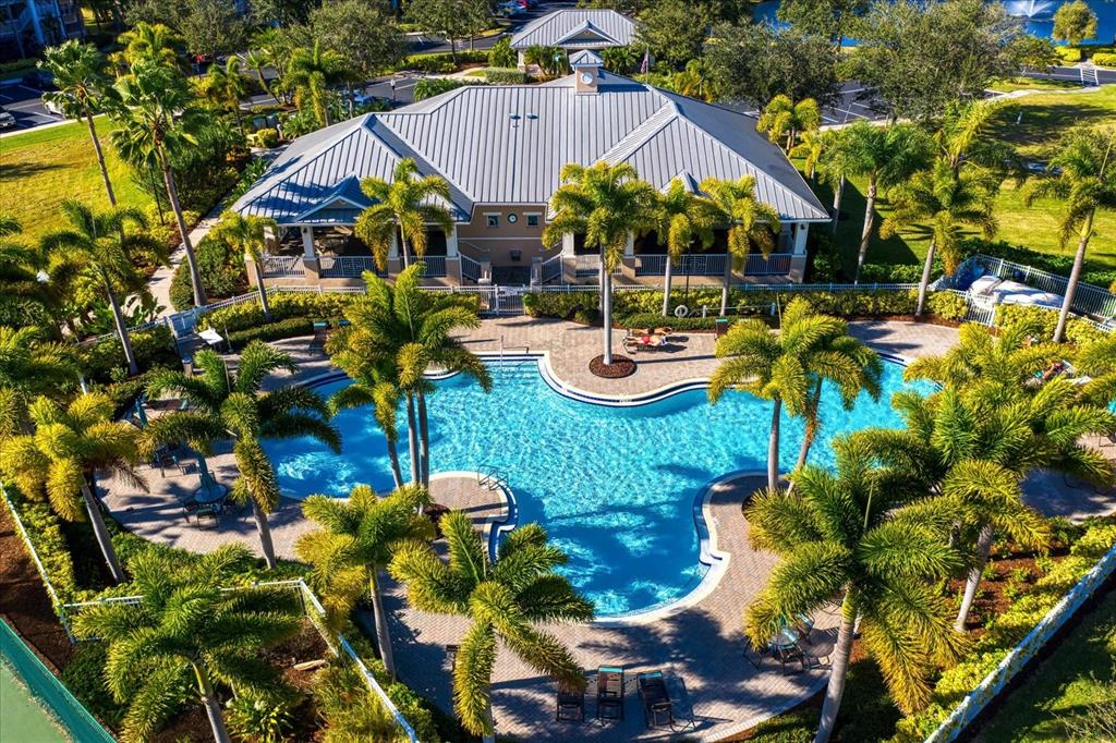 7069 Key Haven Road, Unit 304 Seminole, FL 33777 - Photo 4 of 50 a view of a house with patio and garden