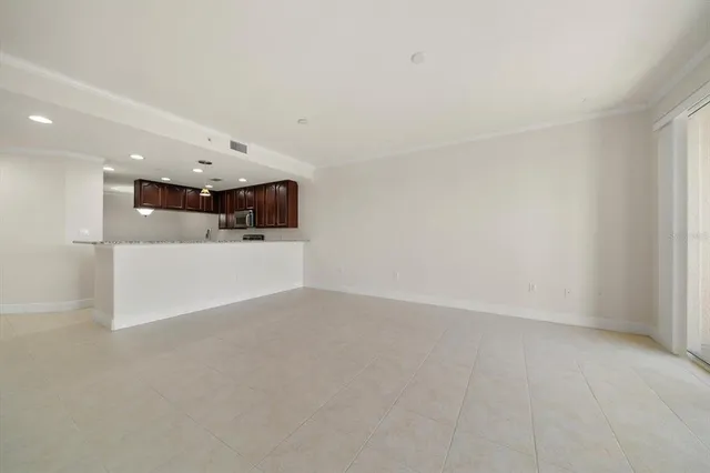 a view of empty room with windows