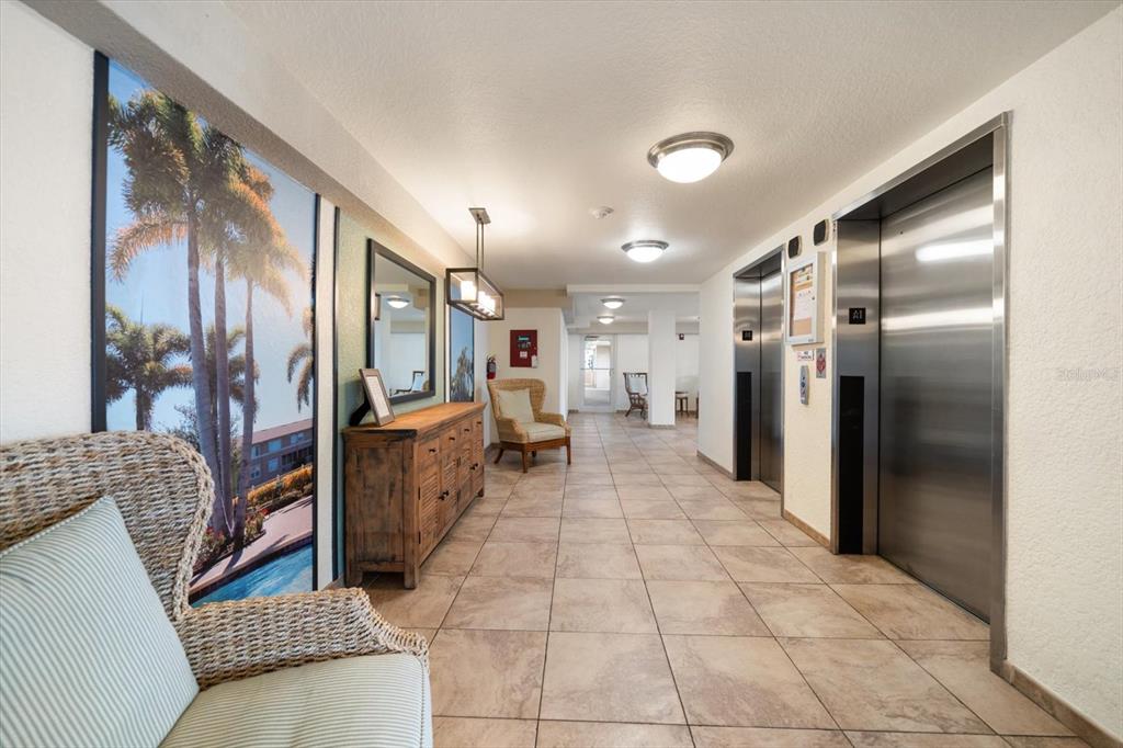 7069 Key Haven Road, Unit 304 Seminole, FL 33777 - Photo 49 of 50 a bathroom with a sink and mirror
