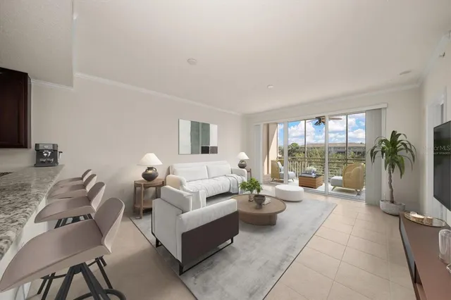 a living room with furniture and a potted plant
