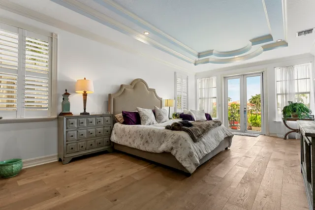 a living room with furniture and windows