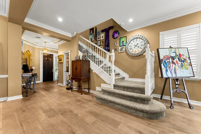 a view of entryway with stairs and furniture