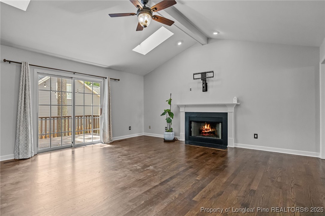 5302 Middleton Road Durham, NC 27713 - Photo 19 of 40 an empty room with windows a fireplace