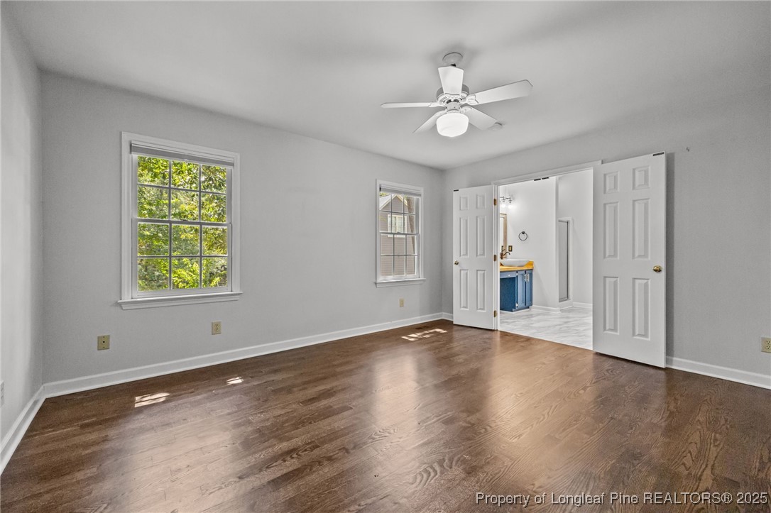 5302 Middleton Road Durham, NC 27713 - Photo 21 of 40 a view of an empty room with window and wooden floor