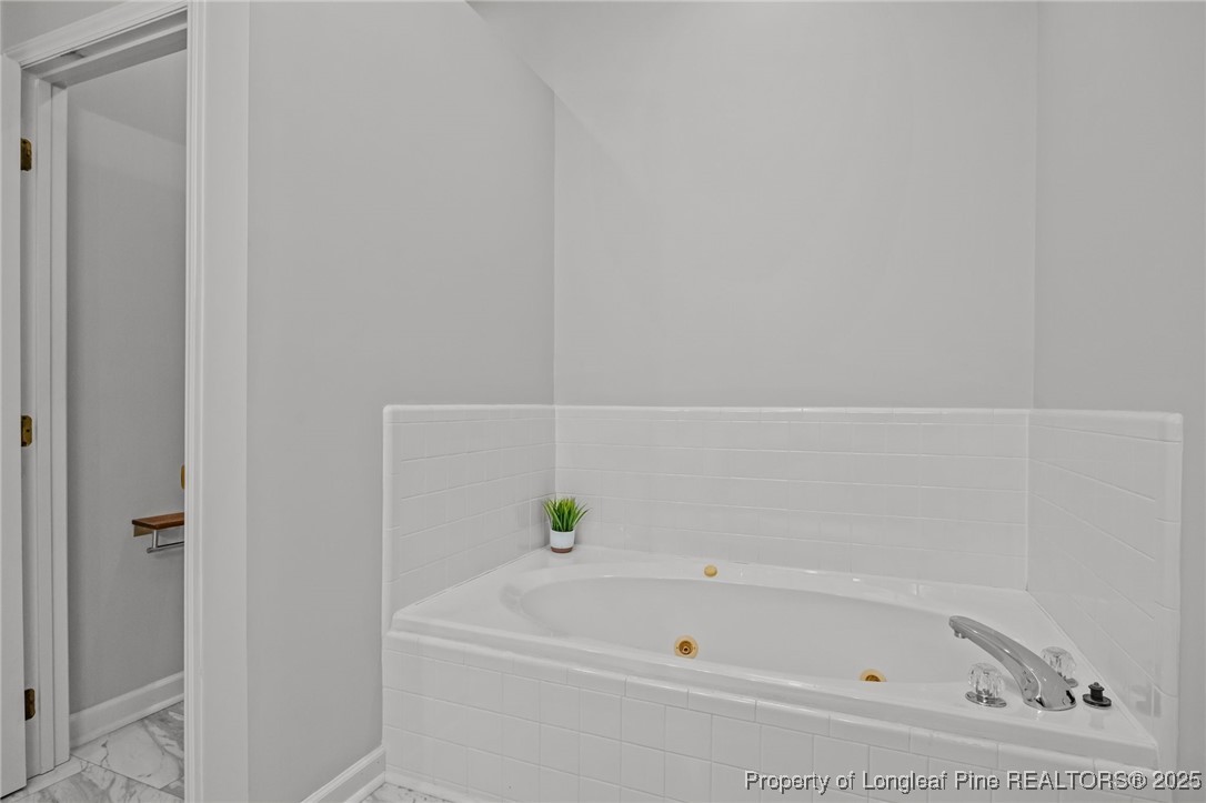 5302 Middleton Road Durham, NC 27713 - Photo 25 of 40 a bathroom with a bathtub