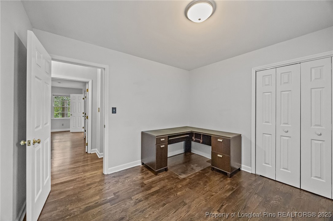 5302 Middleton Road Durham, NC 27713 - Photo 30 of 40 an empty room with wooden floor and a hallway
