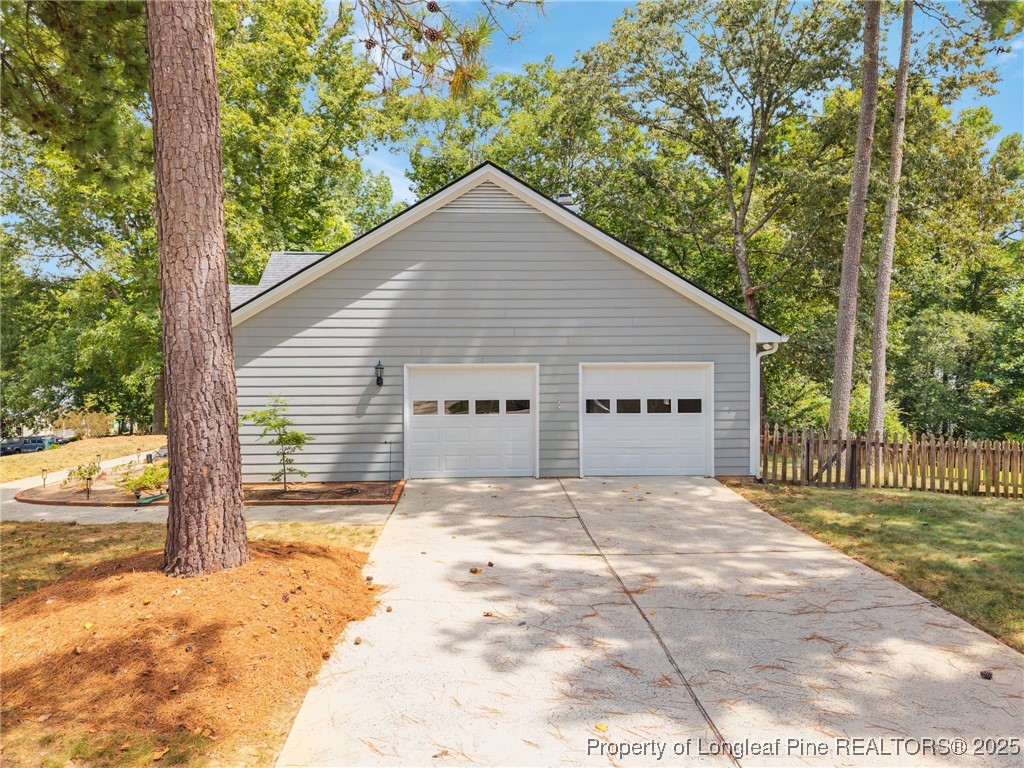 5302 Middleton Road Durham, NC 27713 - Photo 3 of 40 a view of a house with a yard and large tree