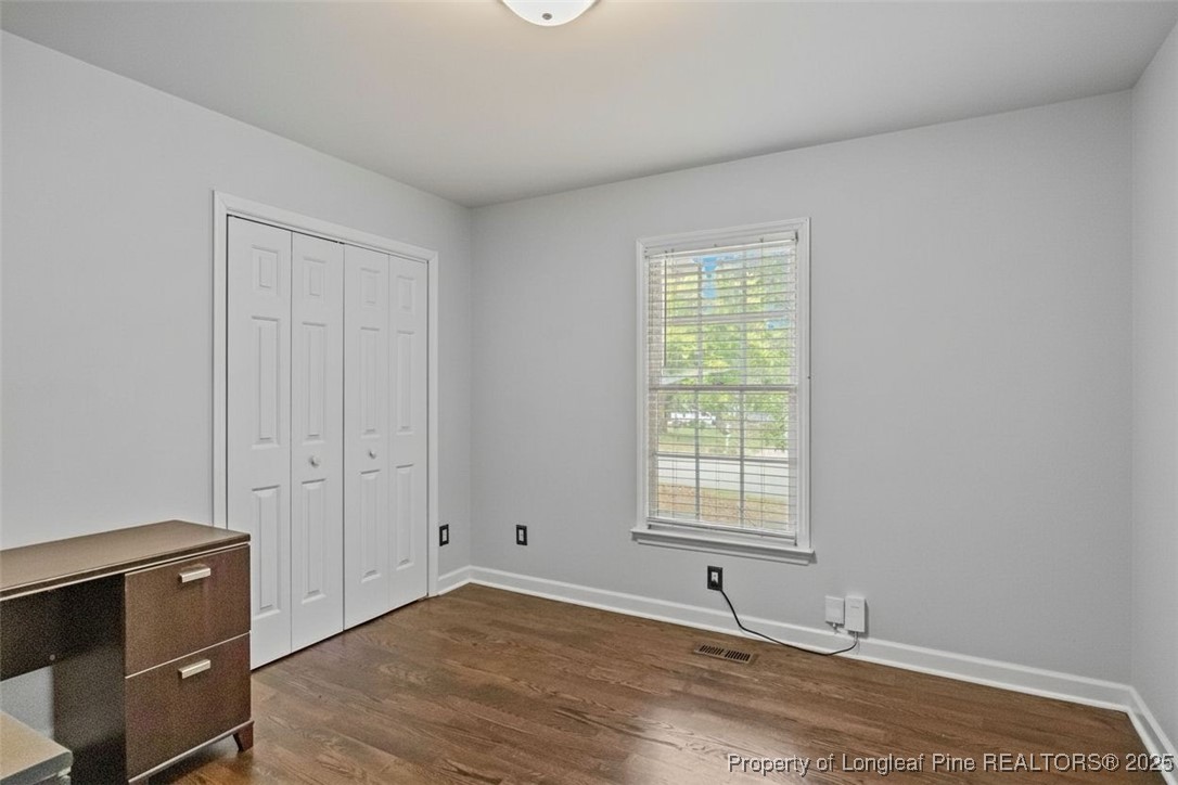 5302 Middleton Road Durham, NC 27713 - Photo 31 of 40 a view of an empty room with wooden floor and a window