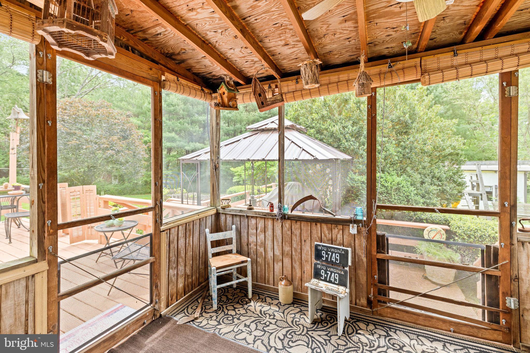 420 Castleton Ford Road Castleton, VA 22716 - Photo 41 of 56 Screened in Porch off the Dining Room