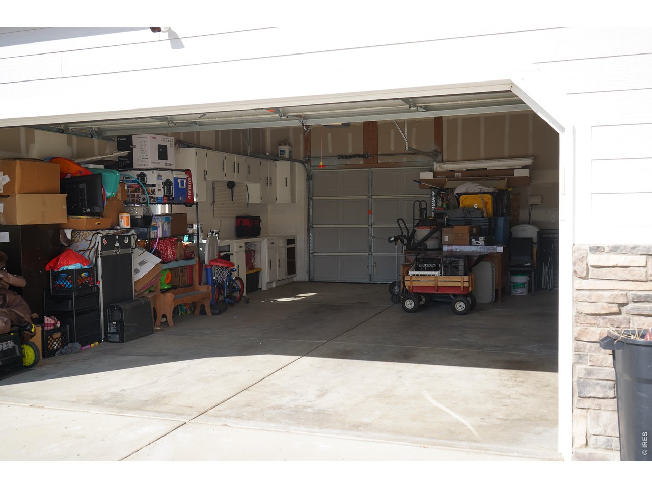 5627 West 16th Street Road Greeley, CO 80634 - Photo 20 of 20 Huge garage with room for toys, workshop and a second garage door for access to the backyard