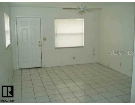 1997 Trotter Road Largo, FL 33774 - Photo 4 of 5 a view of an empty room and window