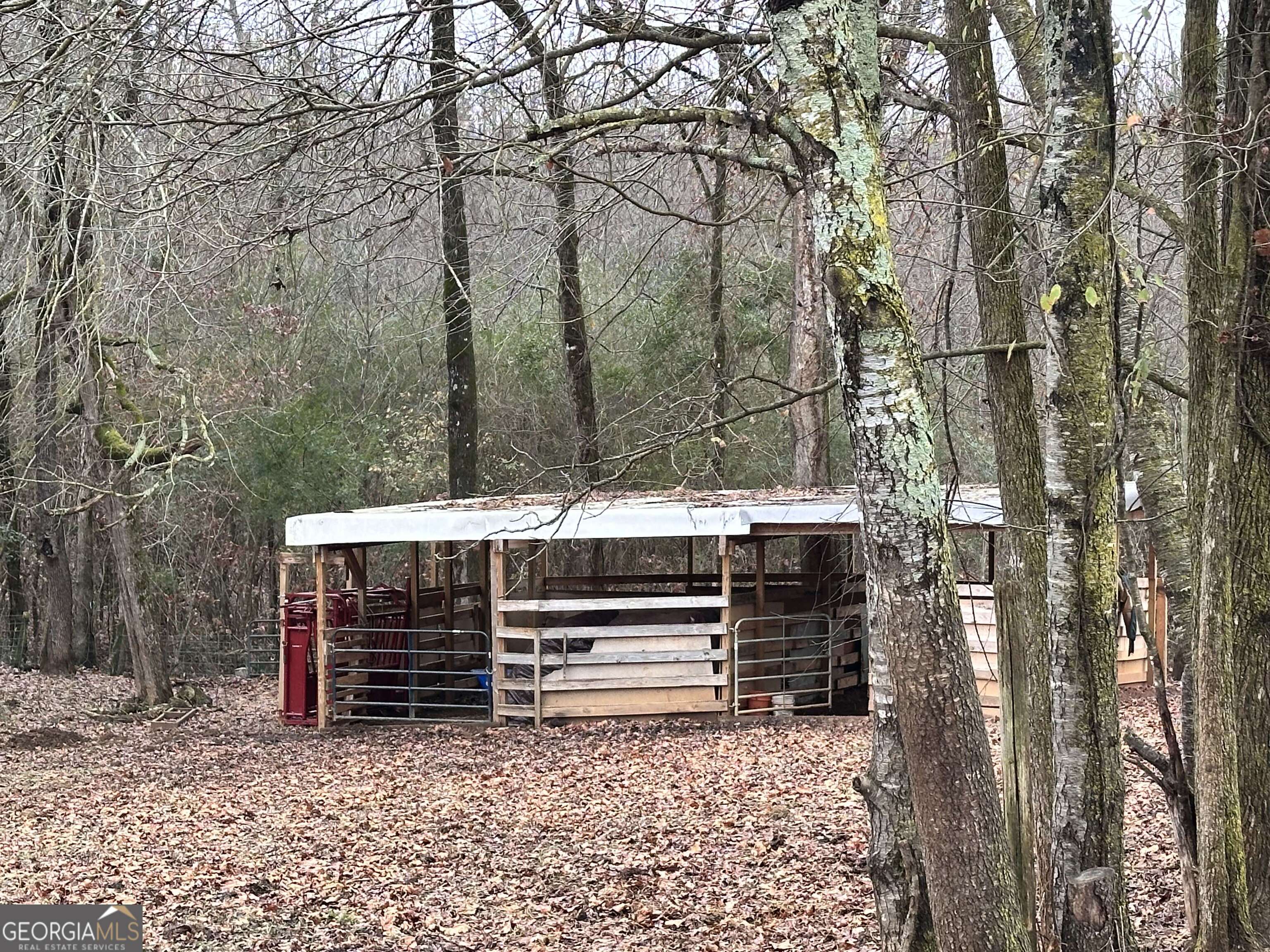 2015 Highway 59 Commerce, GA 30529 - Photo 13 of 27 a view of house with trees in the background