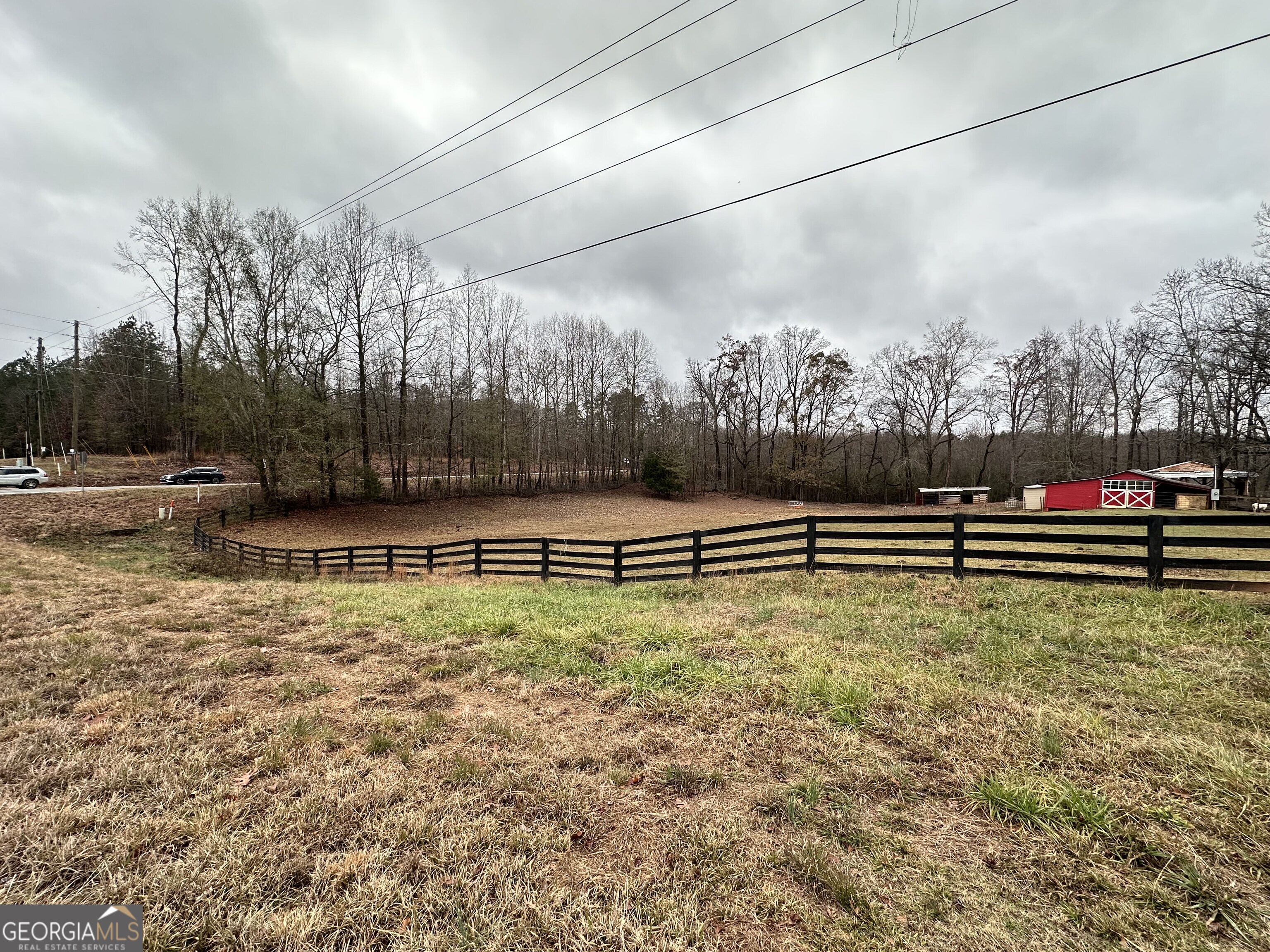 2015 Highway 59 Commerce, GA 30529 - Photo 17 of 27 a view of a yard with wooden fence