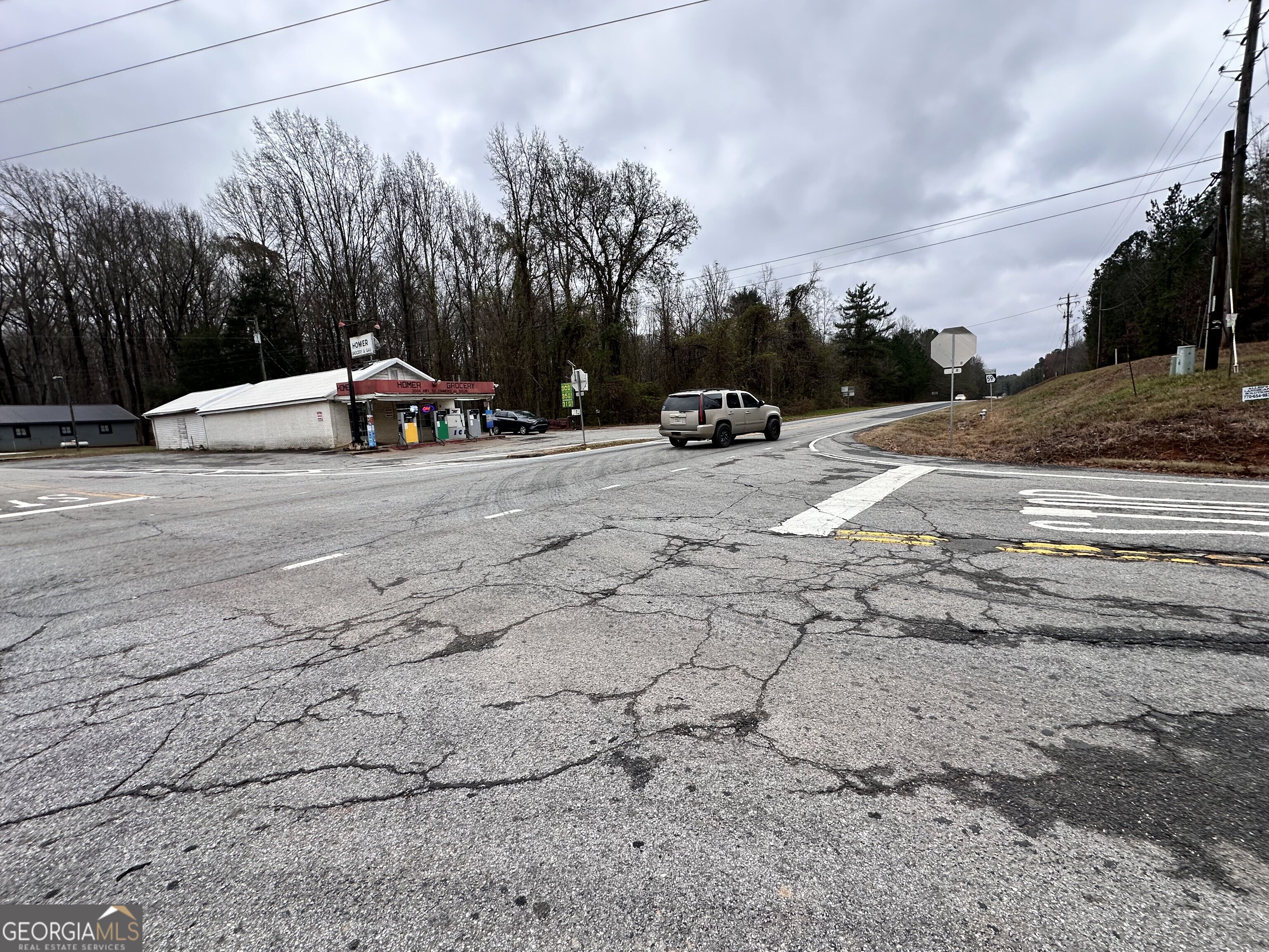 2015 Highway 59 Commerce, GA 30529 - Photo 20 of 27 a view of street with parked cars