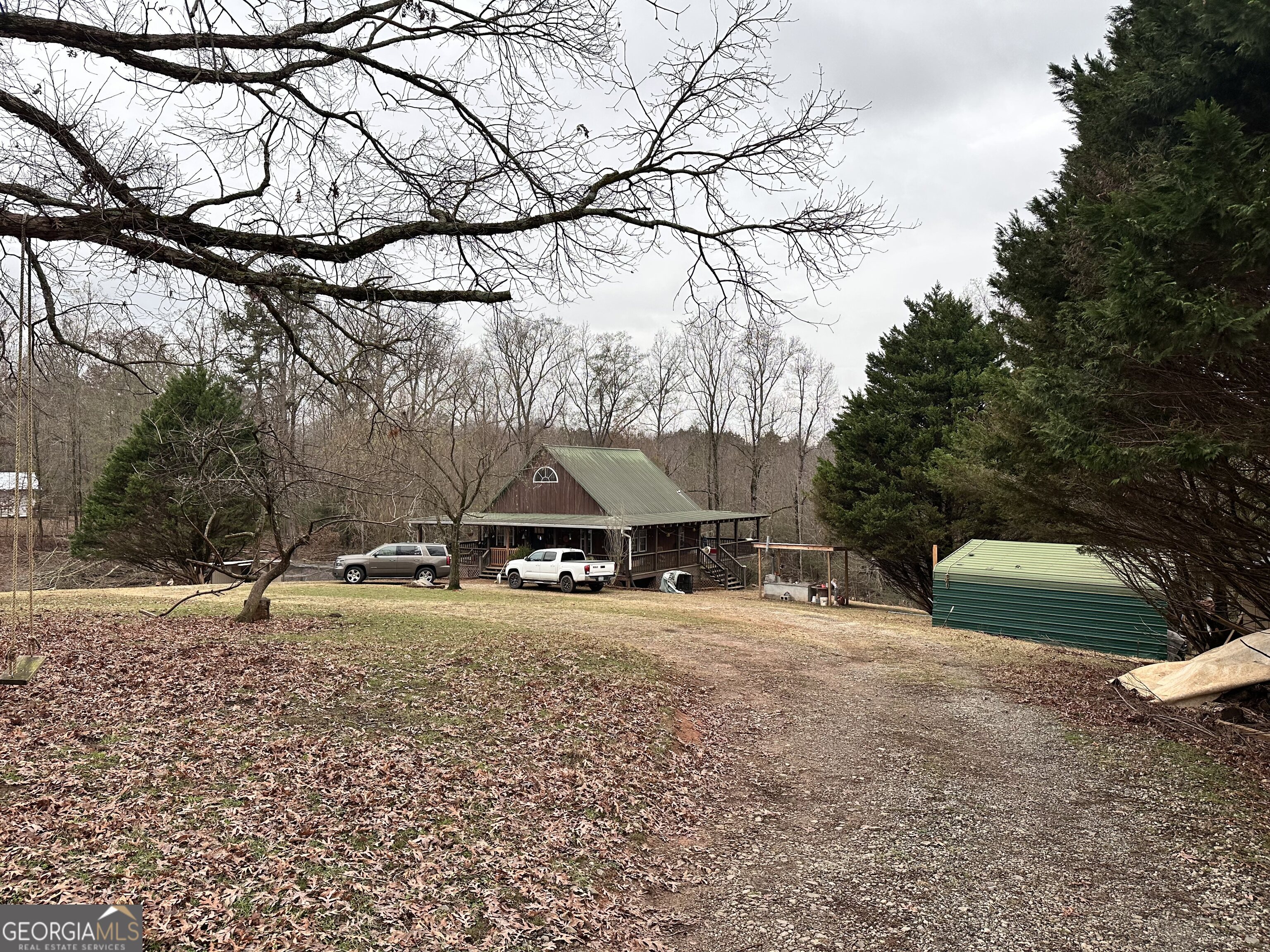 2015 Highway 59 Commerce, GA 30529 - Photo 2 of 27 a view of a dirt road and a building