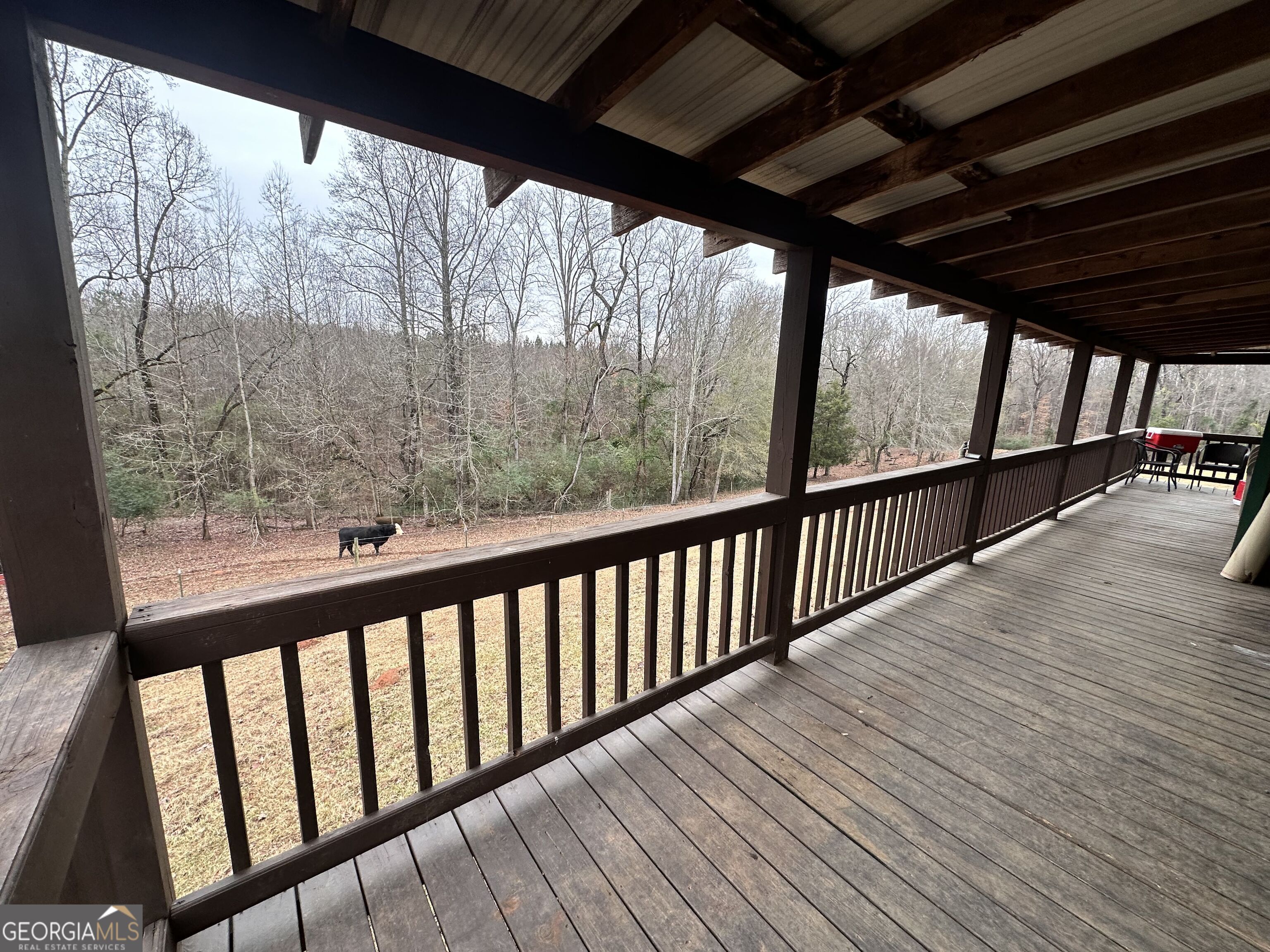 2015 Highway 59 Commerce, GA 30529 - Photo 4 of 27 a view of porch with deck and wooden floor