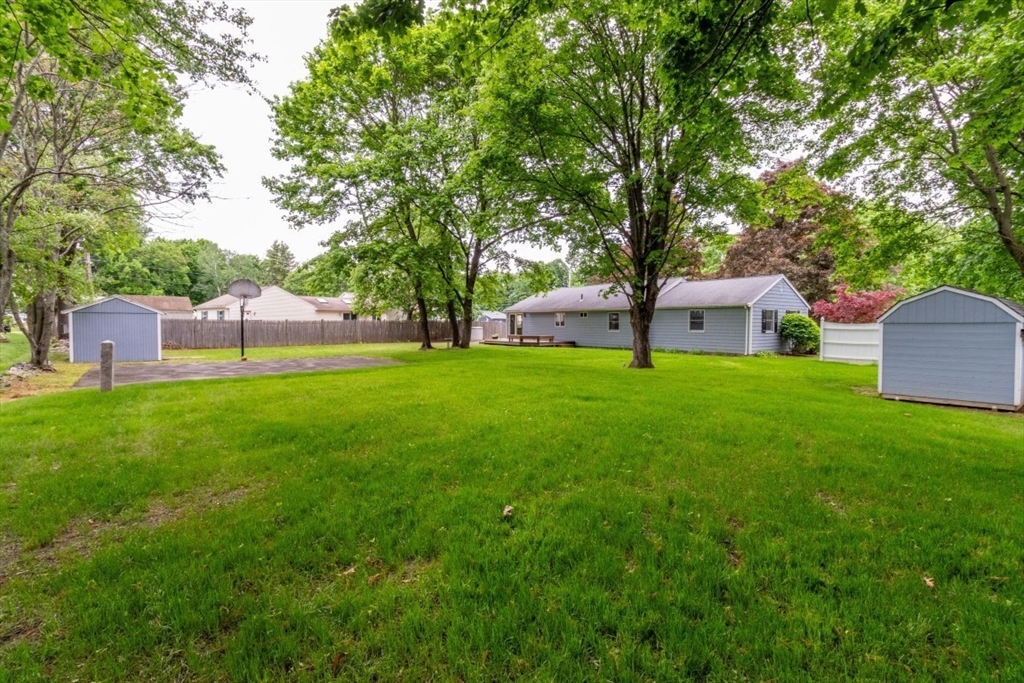 118 Bruce Road Walpole, MA 02081 - Photo 26 of 30 a view of a house with a backyard