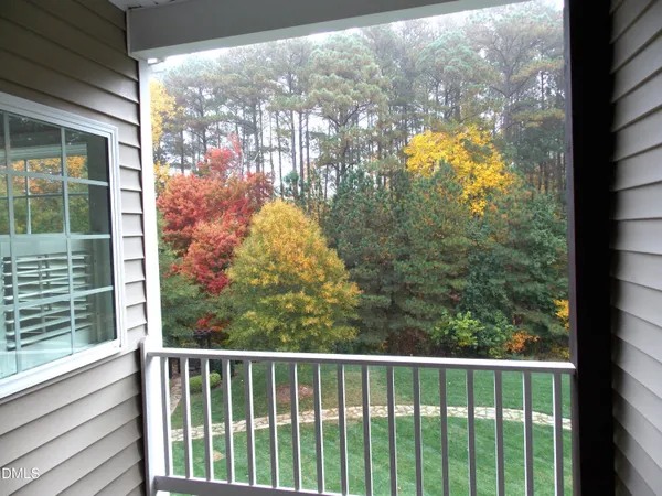 a view of a balcony with lake view