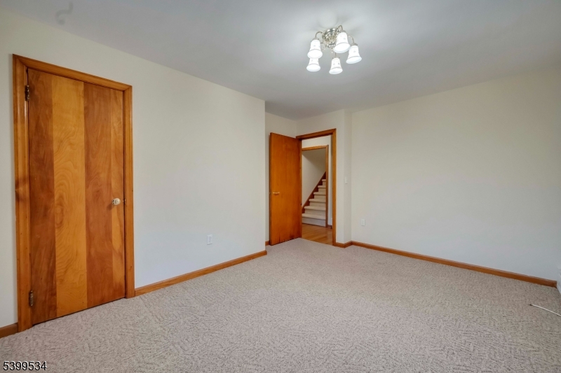 44 Beavers Street High Bridge, NJ 08829 - Photo 20 of 28 a view of empty room with chandelier fan