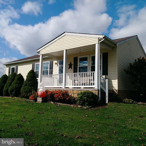 2120 Feeser Road North Taneytown, MD 21787 - Photo 29 of 35 Covered concrete front porch