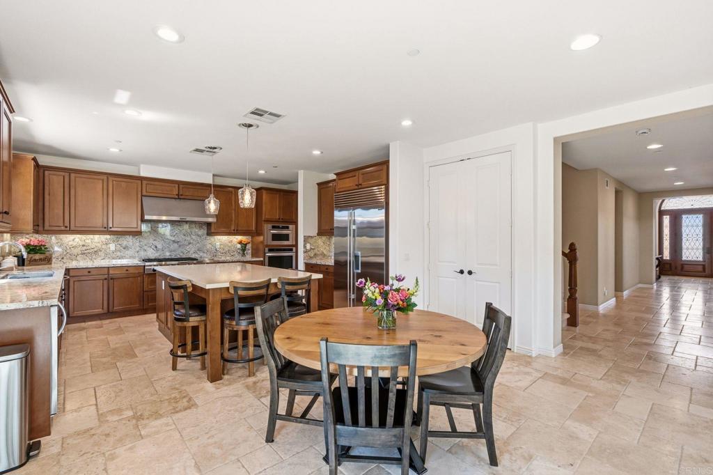 809 Dolphin Circle Encinitas, CA 92024 - Photo 28 of 71 a view of a dining room with furniture