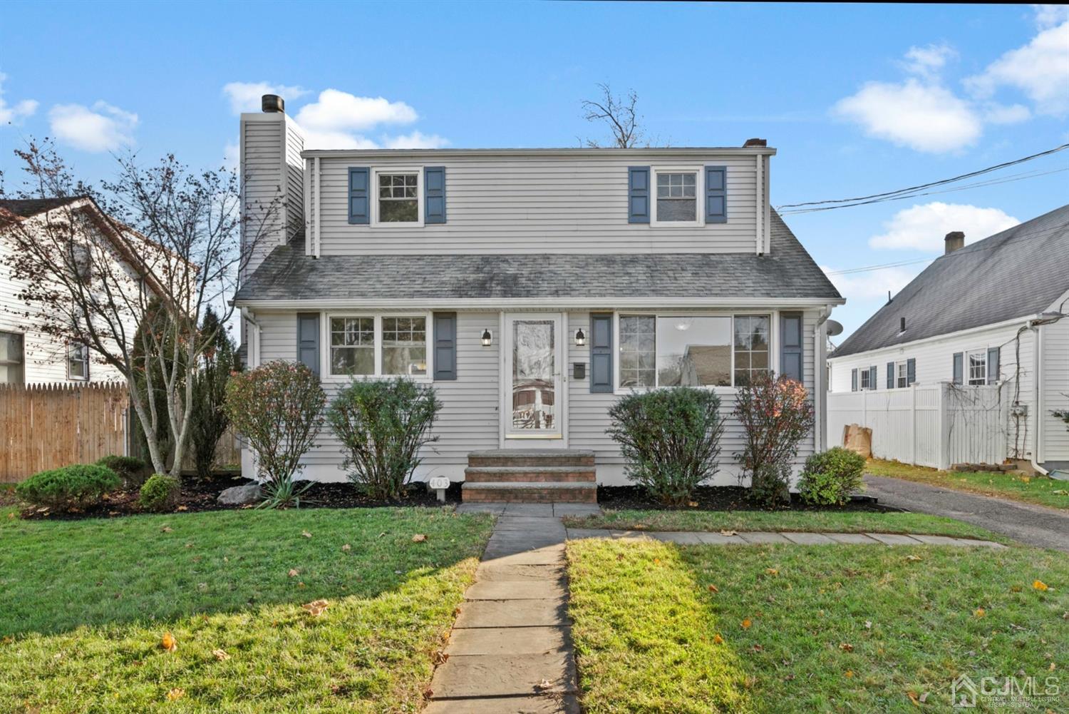 403 Fulton Street Middlesex, NJ 08846 - Photo 1 of 31 a front view of a house with garden