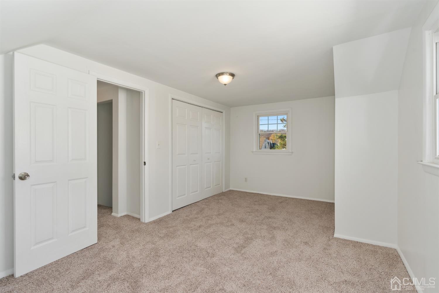 403 Fulton Street Middlesex, NJ 08846 - Photo 15 of 31 an empty room with windows